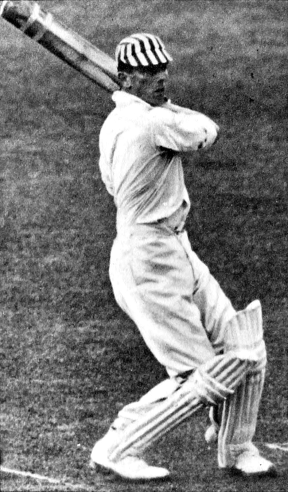 Halftone photograph from Fortune magazine, February 1930, of a young Victor Rothschild batting in cricket whites and a striped cap.