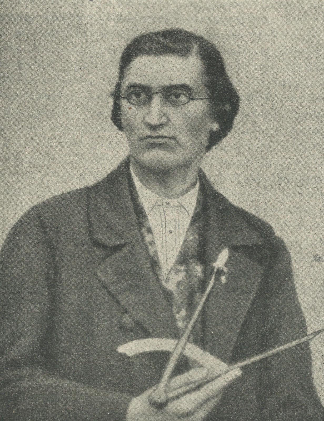 A grainy nineteenth-century halftone portrait of Ernst Abbe as a young student, wearing small oval spectacles and a dark coat.